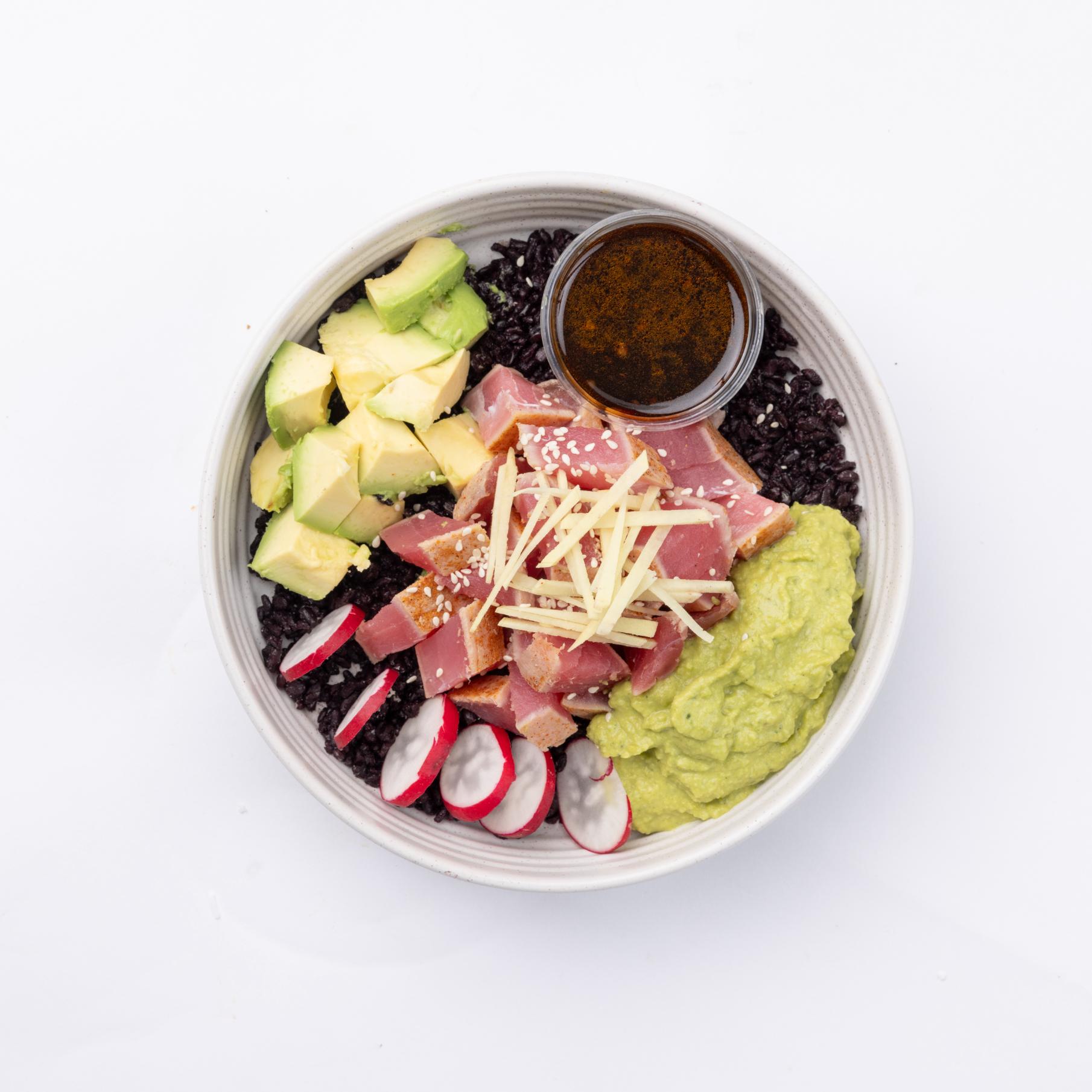 ahi tuna poke Black rice, Ahi tuna, almonds, avocado, wasabi hummus, ginger, radish, sesame seeds, poke sauce