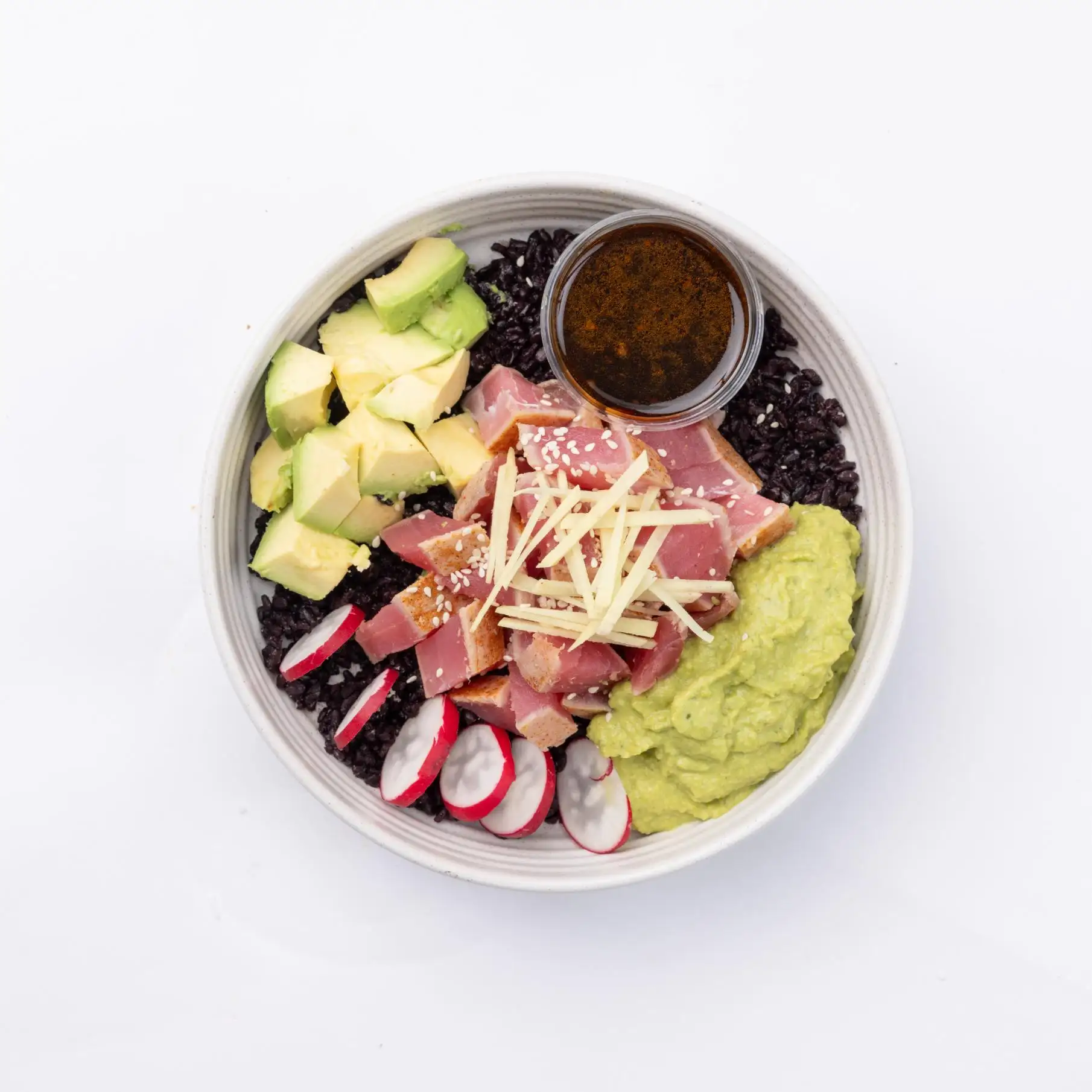 ahi tuna poke Black rice, Ahi tuna, almonds, avocado, wasabi hummus, ginger, radish, sesame seeds, poke sauce