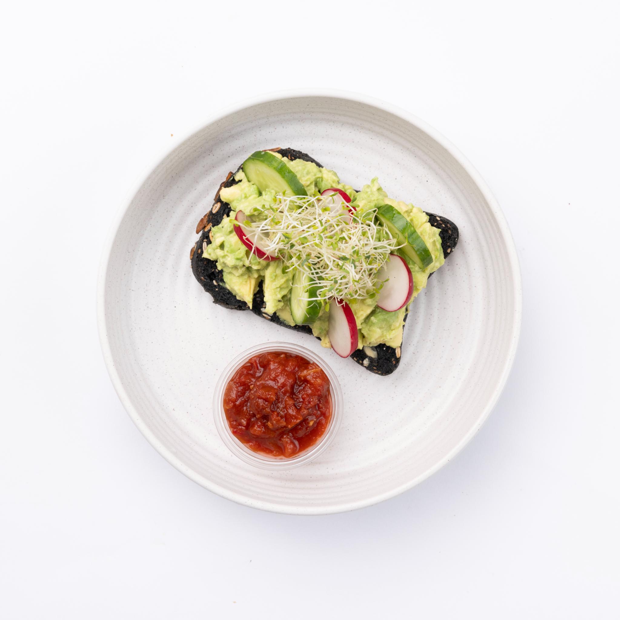 Avocado Smash Choice of charcoal or sourdough bread, Avocado Smash, Lemon, Salt, Black pepper, Cucumber Broccoli sprout, Side Salsa