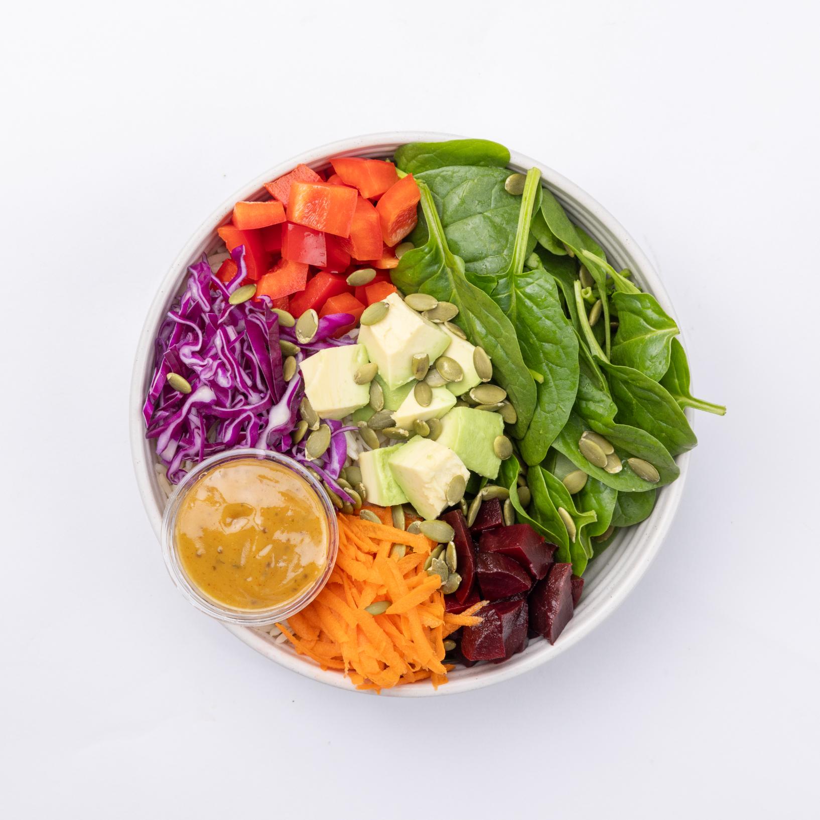 Wild Bowl Spinach, wild rice, red pepper, red beets, cabbage, carrots, pumpkin seeds, avocado, balsamic