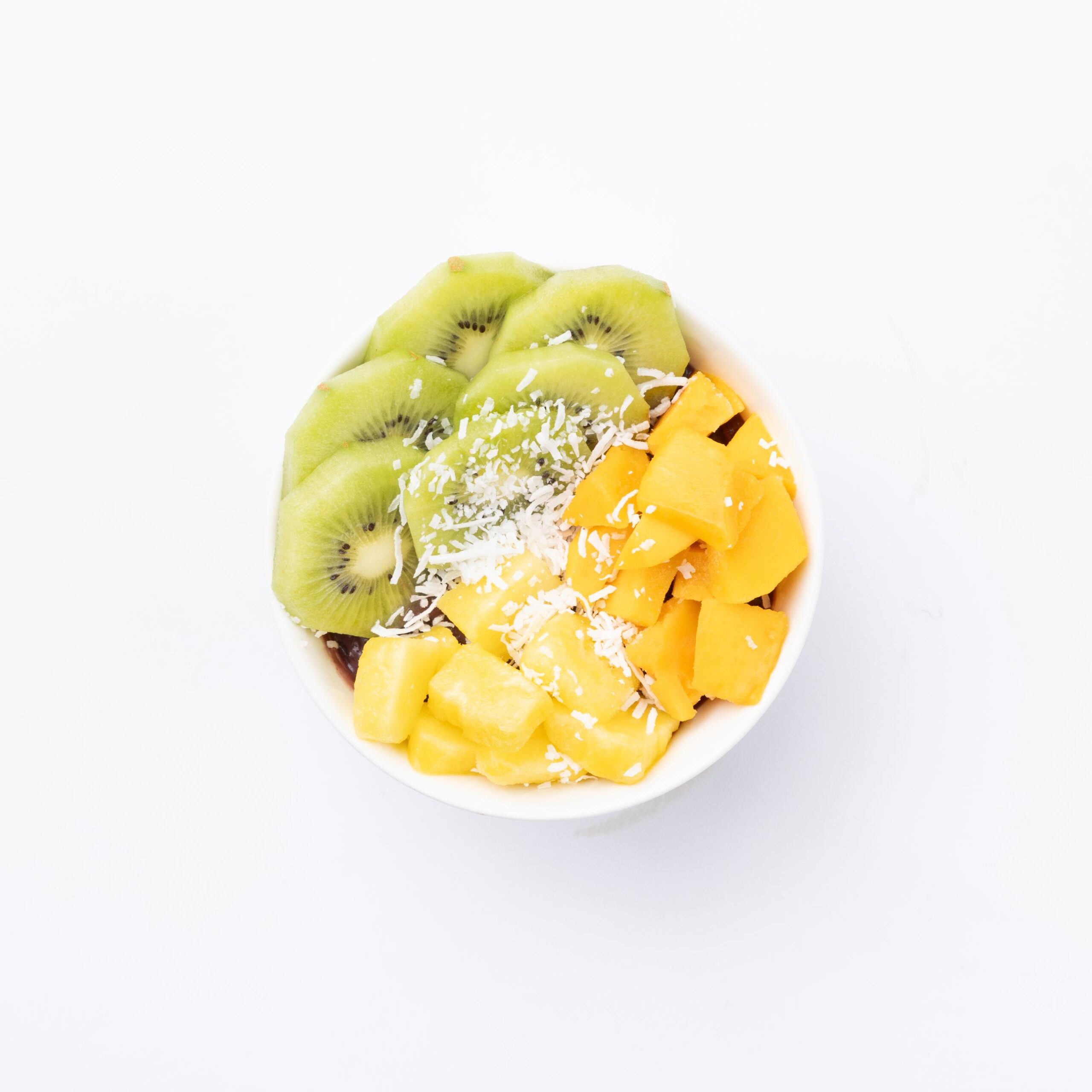 Tropical Bowl Acai, coconut water, banana, mango topped with pineapple, kiwi, apples