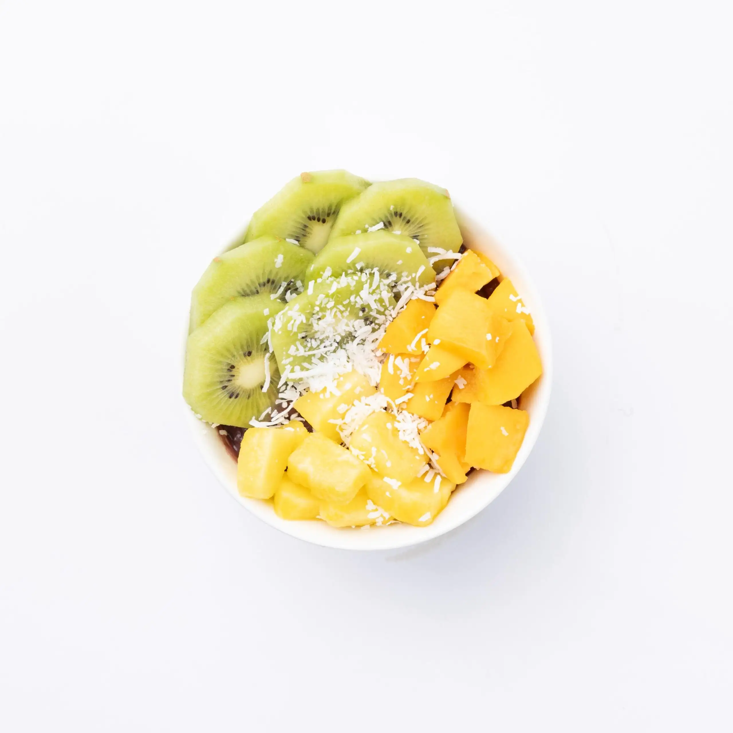 Tropical Bowl Acai, coconut water, banana, mango topped with pineapple, kiwi, apples