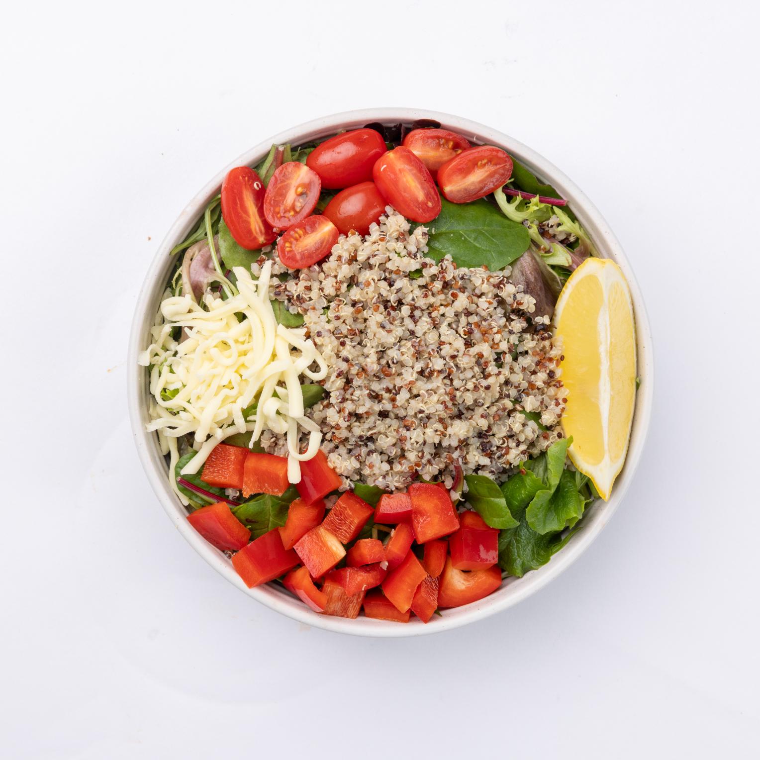 Quinoa Caesar Kale, mixed greens, quinoa, red pepper, tomatoes, parmesan cheese, lemon juice, cashew Caesar