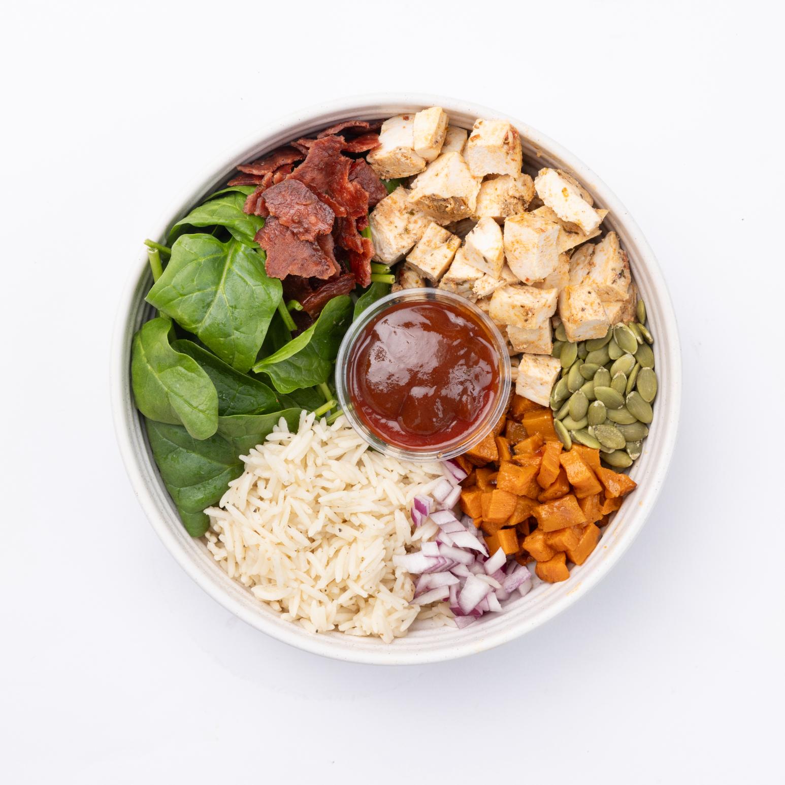 Sweet Papa Bowl Spinach, Wild Rice, Free Range Chicken, Sweet Potatoes, Red Onion, Carrots, Pumpkin Seed, Turkey Bacon, Dressing